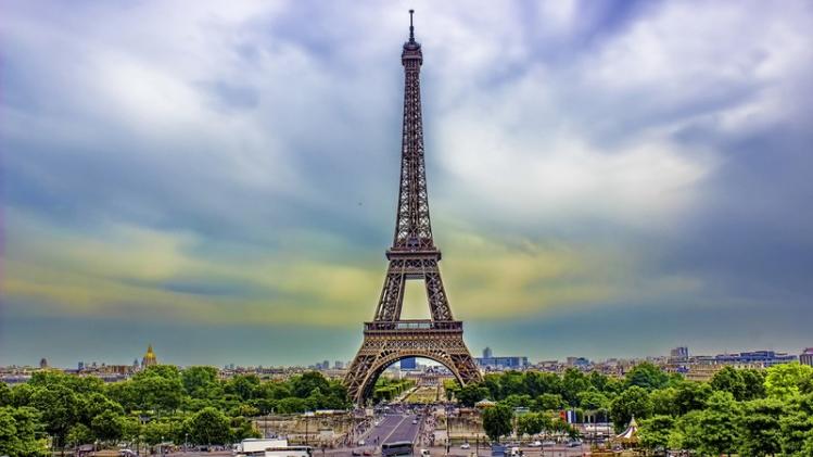 Eiffel Tower under cloudy sky in Paris; France