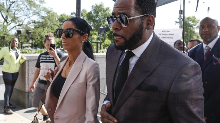 R. Kelly arrives for a hearing on sexual abuse charges in Chicago