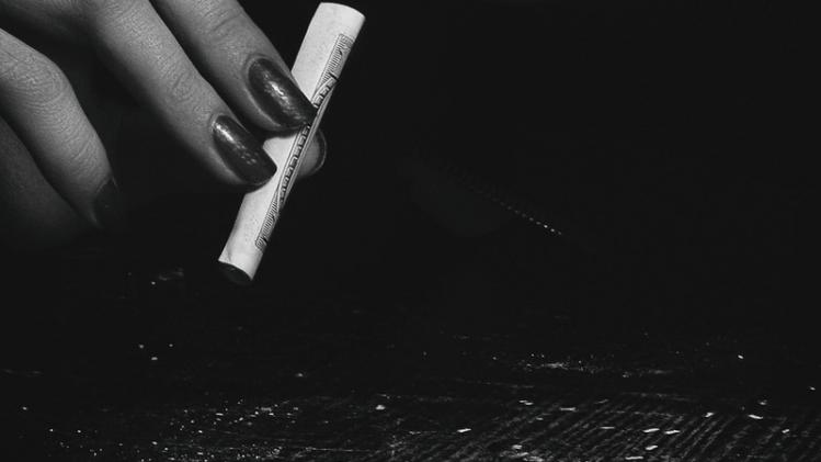 woman-holding-a-blunt-1089423