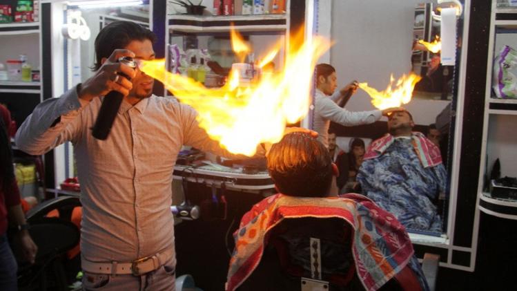 Barber Uses Fire To Style Hair