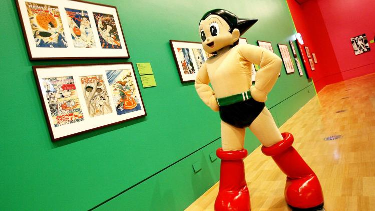 Astro_Boy_inspects_the_work_at_Melbourne_s_National_Gallery_of_Victoria_NGV_