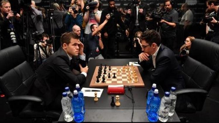WK schaken - Carlsen en Caruana houden het in openingspartij na 115 zetten bij remise