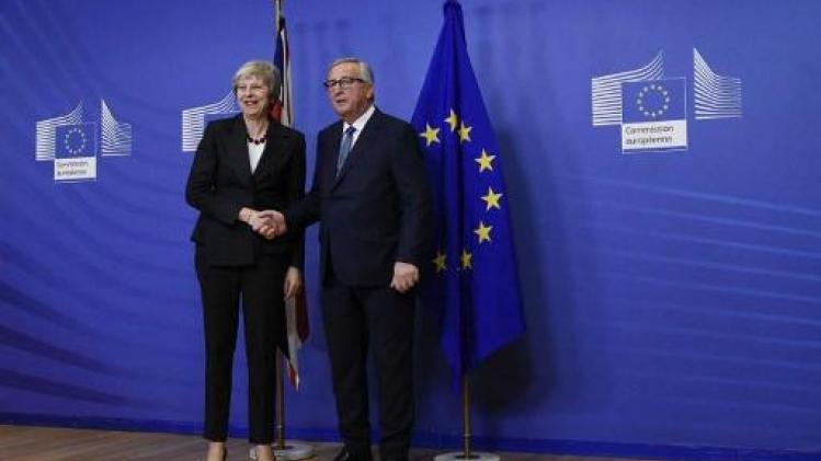 May en Juncker proberen plooien glad te strijken in Brussel