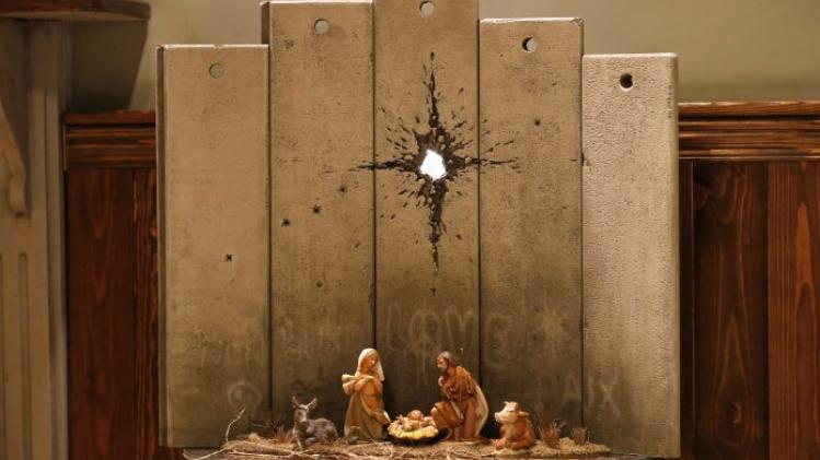 Banksy installeert duister kersttafereel in Bethlehem