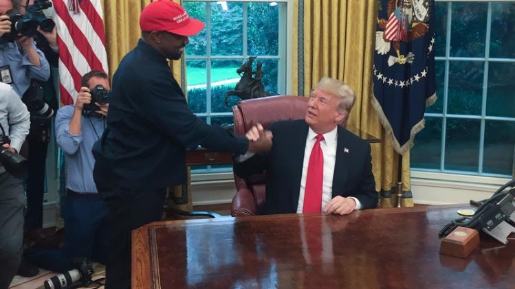 Trump hosts lunch for the rapper Kanye West, with the pair due to discuss issues including gun violence and prison reform