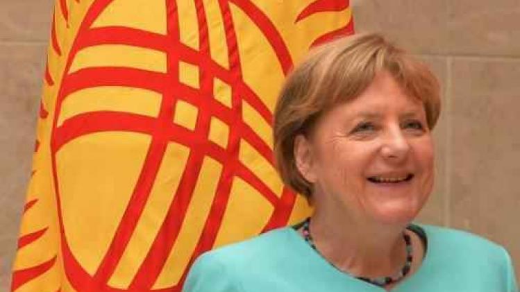 Merkel nodigt Theresa May uit naar Duitsland