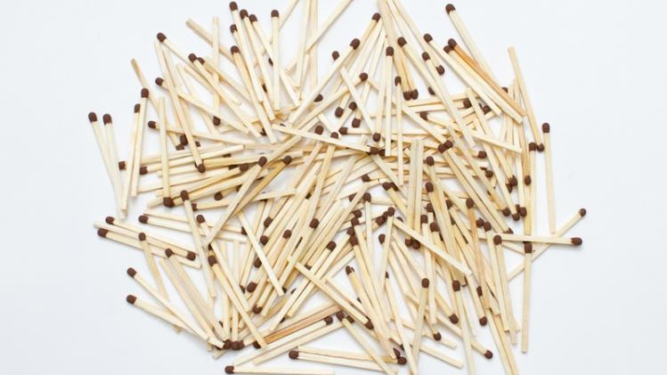 heap of safety match on white background