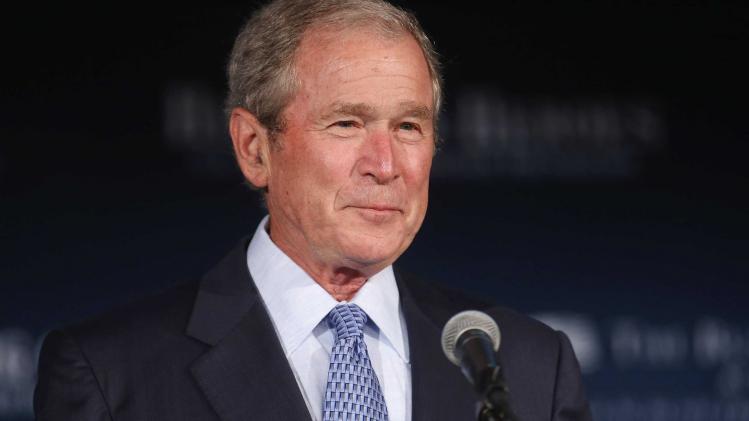 George W. Bush And Laura Bush Speak At Veteran's Employment Opportunities Summit In D.C.