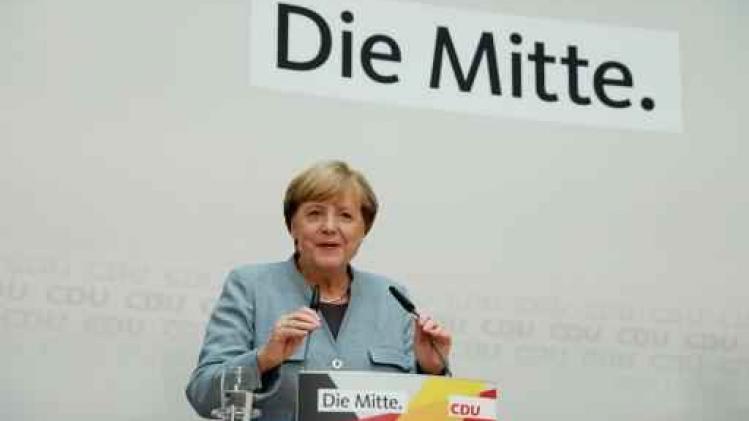 Merkel kondigt coalitiegesprekken aan met FDP