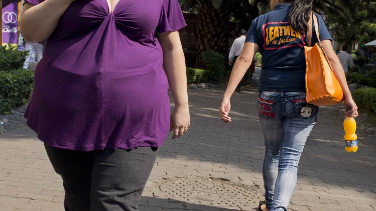 Overgewicht is besmettelijk, zo beweren Amerikaanse onderzoekers. De kans op obesitas is veel groter als mensen uit je omgeving ook te zwaar zijn.