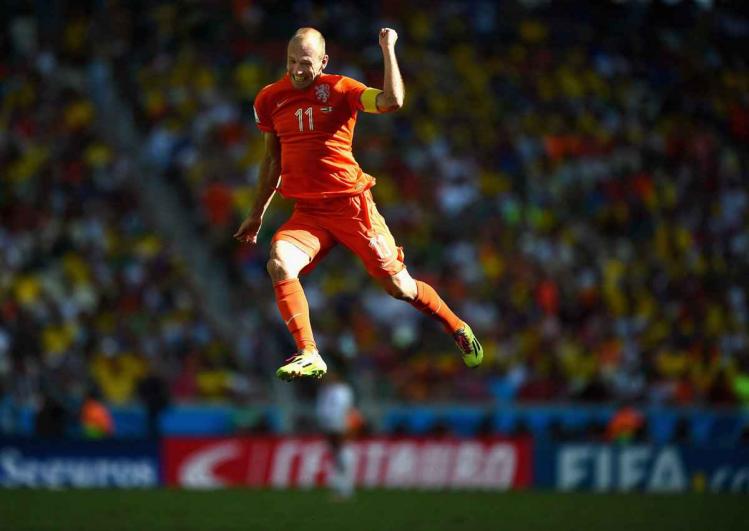 arjen-robbens-of-the-netherlands-celebrates-a-victory-over-mexico.jpg