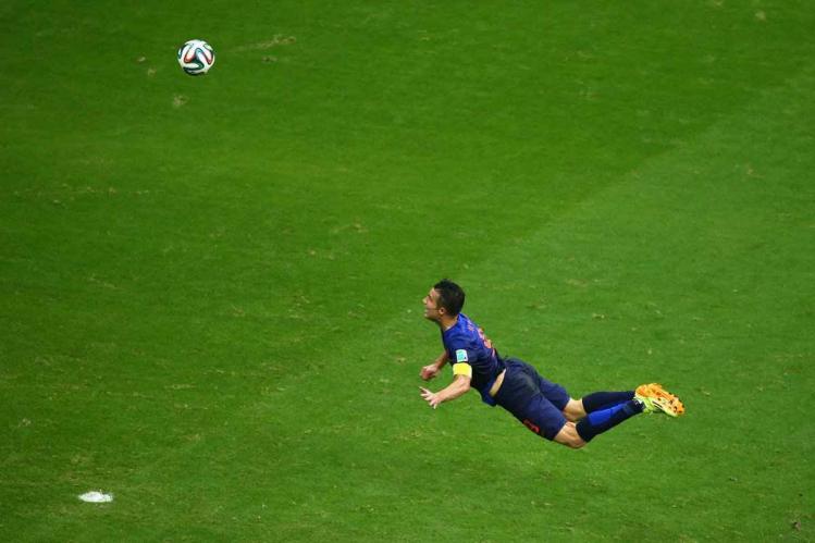 robin-van-persie-of-the-netherlands-soars-through-the-air-and-scores-a-gorgeous-header.jpg
