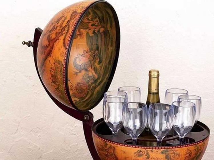 if-youd-rather-keep-glasses-tucked-away-go-for-this-classy-globe-bar.jpg