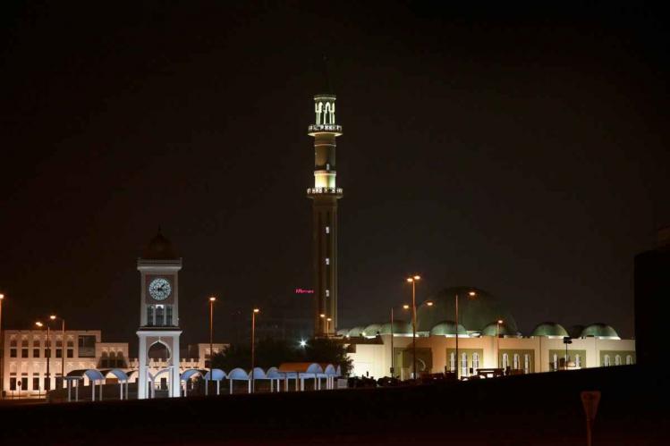 now-and-here-is-the-clock-tower-today-dwarfed-by-the-grand-mosque-at-the-emiri-palace-in-the-background.jpg