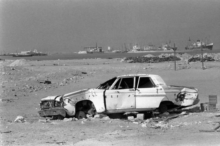 then-a-discarded-plymouth-convertible-american-car-is-seen-on-the-outskirts-of-the-city-in-1977-where-it-was-dumped-in-the-desert.jpg