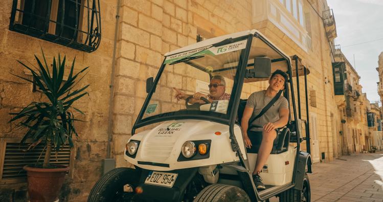 Father and son on Rolling Geek in Birgu